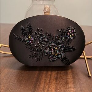 Elegant Black Floral Clutch